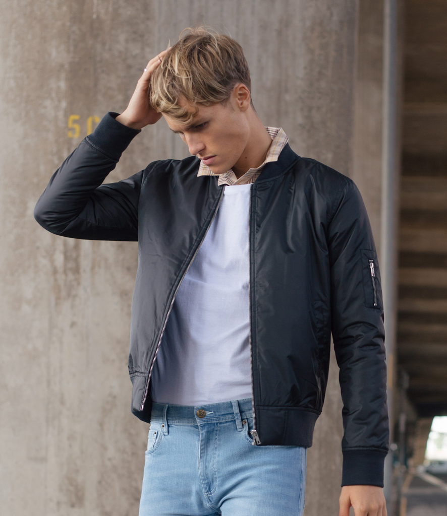 bomber jacket and jeans